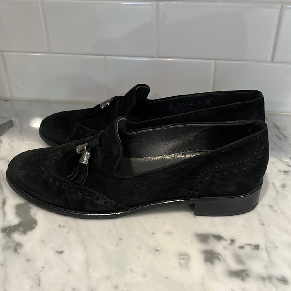 Black suede Stuart Weitzman loafers with tassel